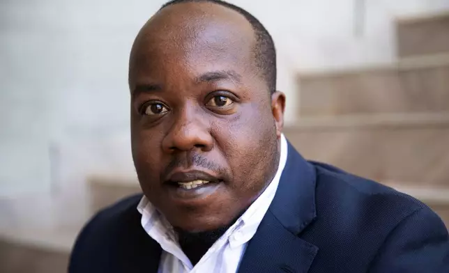 Amos Wemanya, senior climate advisor at Power Shift Africa, poses for a photo during an interview with The Associated Press in Nairobi, Kenya, Wednesday, Feb. 4, 2026. (AP Photo/ÅSA WALLIN)