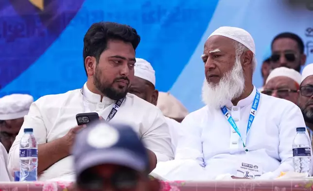 National Citizen Party (NCP) convener Nahid Islam, left, talks to Jamaat-e-Islami leader Shafiqur Rahman during an election rally in Dhaka, Bangladesh, on Feb. 9, 2026. (AP Photo/Anupam Nath)