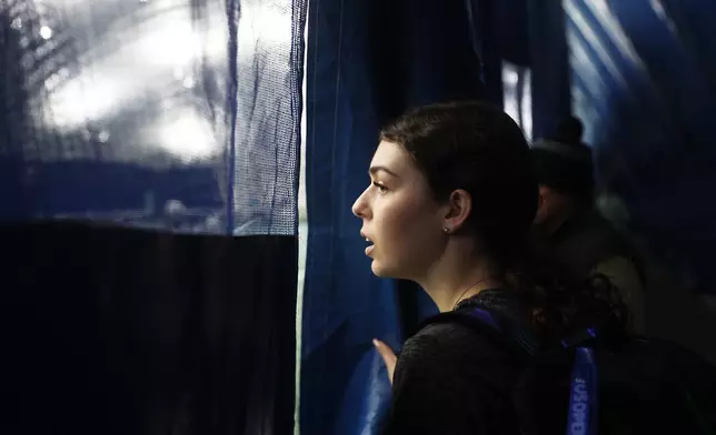 Mariia Vainshtein enters the court for tennis practice at the Cary Leeds Center for Tennis and Learning in the Bronx borough of New York, Saturday, Jan. 31, 2026.(AP Photo/Heather Khalifa)