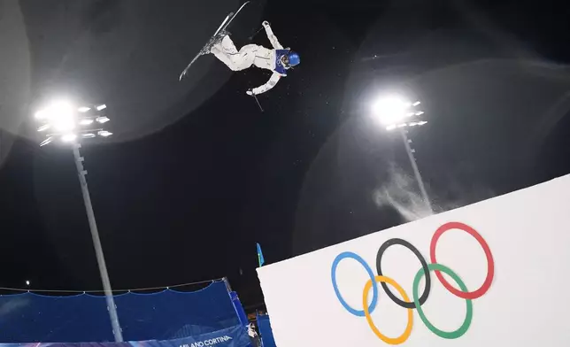 China's Eileen Gu warms up before the women's freestyle skiing big air qualifications at the 2026 Winter Olympics, in Livigno, Italy, Saturday, Feb. 14, 2026. (AP Photo/Lindsey Wasson)