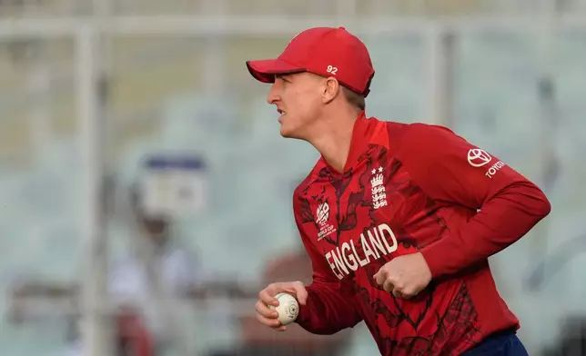 England's captain Harry Brook takes the catch to get dismiss Italy's Anthony Mosca during the T20 World Cup cricket match between England and Italy in Kolkata, India, Monday, Feb. 16, 2026. (AP Photo/Bikas Das)