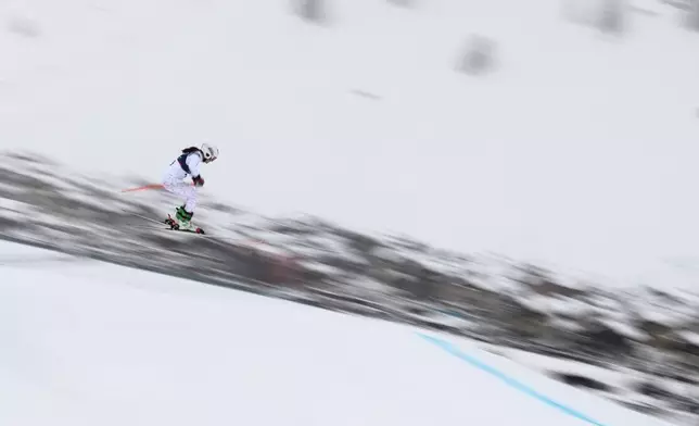 Slovakia's Nikola Fricova (29) competes during the women's ski cross qualifications at the 2026 Winter Olympics, in Livigno, Italy, Friday, Feb. 20, 2026. (AP Photo/Gabriele Facciotti)