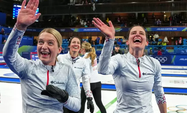 United States' Cory Thiesse, Tabitha Peterson, and Tara Peterson react after the women's curling round robin session against Switzerland, at the 2026 Winter Olympics, in Cortina d'Ampezzo, Italy, Thursday, Feb. 19, 2026. (AP Photo/Misper Apawu)