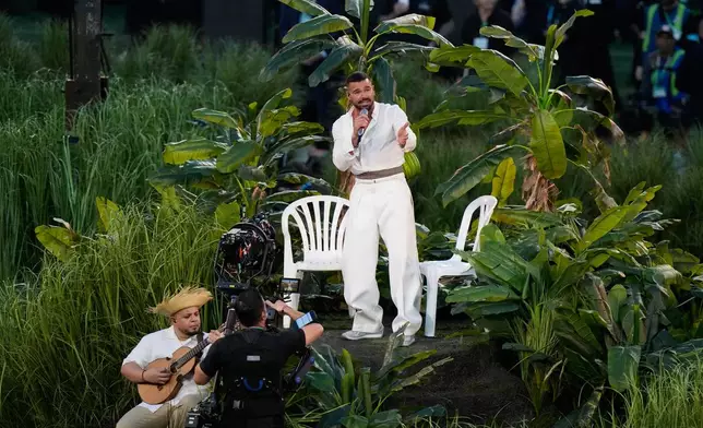 Ricky Martin performs with Bad Bunny during halftime of the NFL Super Bowl 60 football game between the Seattle Seahawks and the New England Patriots, Sunday, Feb. 8, 2026, in Santa Clara, Calif. (AP Photo/Frank Franklin II)