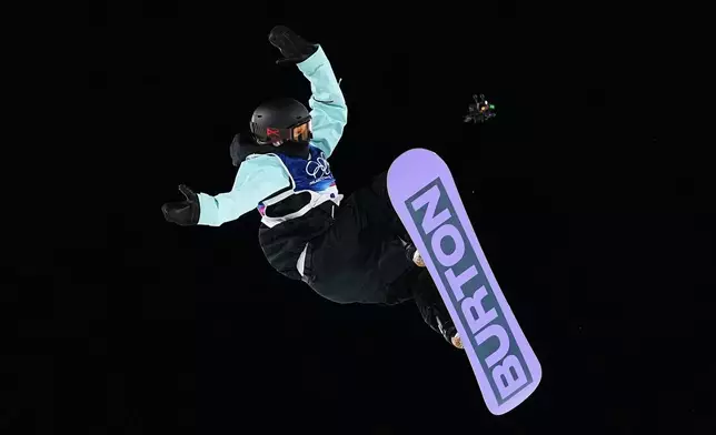 Austria's Hanna Karrer competes during the women's snowboarding big air finals at the 2026 Winter Olympics, in Livigno, Italy, Monday, Feb. 9, 2026. (AP Photo/Lindsey Wasson)