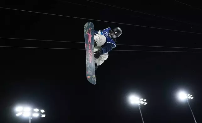 Japan's Ayumu Hirano practices before the men's snowboarding halfpipe finals at the 2026 Winter Olympics, in Livigno, Italy, Friday, Feb. 13, 2026. (AP Photo/Lindsey Wasson)