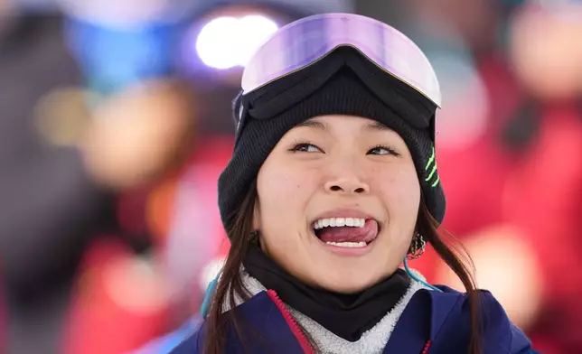 United States' Chloe Kim reacts to her score during the women's snowboarding halfpipe qualifications at the 2026 Winter Olympics, in Livigno, Italy, Wednesday, Feb. 11, 2026. (AP Photo/Lindsey Wasson)