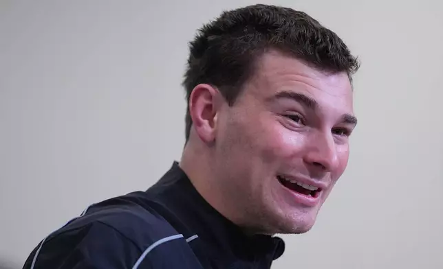 Indiana quarterback Fernando Mendoza, speaks during a news conference at the NFL football scouting combine in Indianapolis, Friday, Feb. 27, 2026. (AP Photo/Julio Cortez)