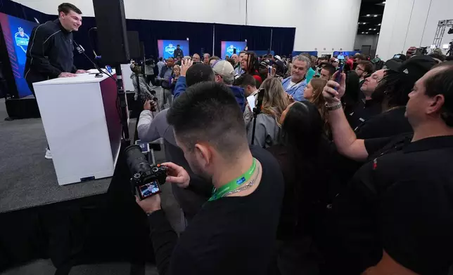 Indiana quarterback Fernando Mendoza, speaks during a news conference at the NFL football scouting combine in Indianapolis, Friday, Feb. 27, 2026. (AP Photo/Julio Cortez)