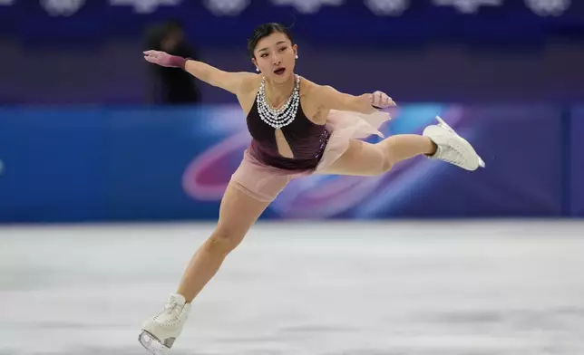 Kaori Sakamoto of Japan competes during the women's figure skating free program at the 2026 Winter Olympics, in Milan, Italy, Thursday, Feb. 19, 2026. (AP Photo/Stephanie Scarbrough)
