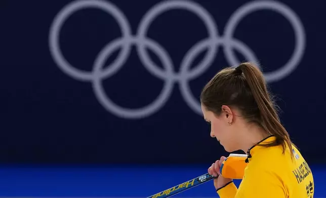 Sweden's Anna Hasselborg reacts during a women's curling gold medal match between Switzerland and Sweden, at the 2026 Winter Olympics, in Cortina d'Ampezzo, Italy, Sunday, Feb. 22, 2026. (AP Photo/Misper Apawu)