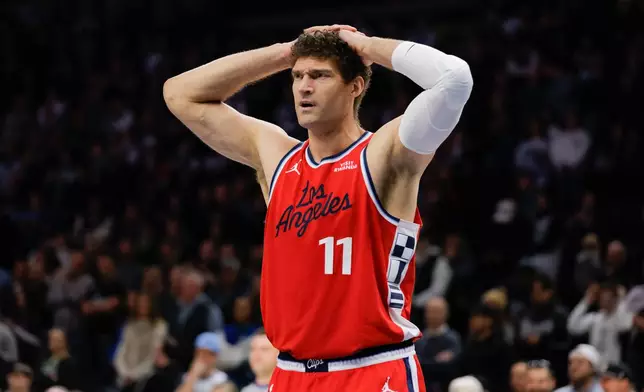 Los Angeles Clippers center Brook Lopez looks on after fouling during the first half of an NBA basketball game against the Minnesota Timberwolves, Sunday, Feb. 8, 2026, in Minneapolis. (AP Photo/Bailey Hillesheim)