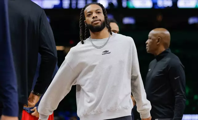 Los Angeles Clippers guard Darius Garland looks on during the first half of an NBA basketball game against the Minnesota Timberwolves, Sunday, Feb. 8, 2026, in Minneapolis. (AP Photo/Bailey Hillesheim)