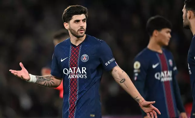 PSG's Lucas Beraldo reacts during the French League One soccer match between Paris Saint-Germain and Metz in Paris, France, Saturday, Feb. 21, 2026. (AP Photo/Emma Da Silva)