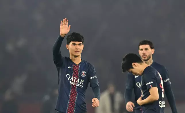 PSG's Dro Fernandez gestures before the French League One soccer match between Paris Saint-Germain and Metz in Paris, France, Saturday, Feb. 21, 2026. (AP Photo/Emma Da Silva)