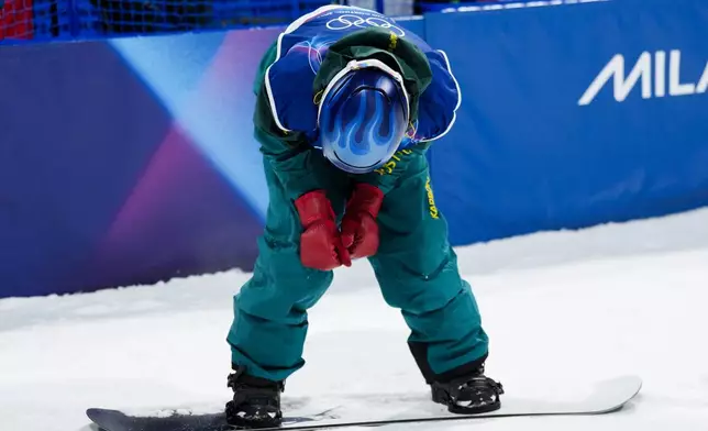 Australia's Scotty James reacts after falling on his last run to win the silver medal during the men's snowboarding halfpipe finals at the 2026 Winter Olympics, in Livigno, Italy, Friday, Feb. 13, 2026. (AP Photo/Abbie Parr)