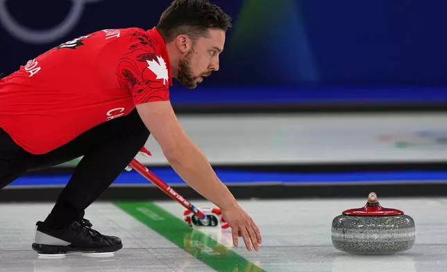 Canada Canada's Brett Gallant in action during the mixed doubles round robin phase of the curling competition against the Czech Republic, at the 2026 Winter Olympics, in Cortina d'Ampezzo, Italy, Wednesday, Feb. 4, 2026. (AP Photo/Fatima Shbair)