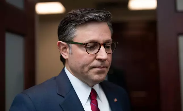 Speaker of the House Mike Johnson, R-La., pauses for questions from reporters as he arrives for a closed-door Republican Conference meeting on how to end the partial government shutdown, at the Capitol in Washington, early Tuesday, Feb. 3, 2026. (AP Photo/J. Scott Applewhite)