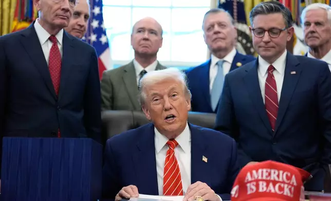 President Donald Trump speaks in the Oval Office of the White House, Tuesday, Feb. 3, 2026, in Washington, before signing a spending bill that will end a partial shutdown of the federal government. (AP Photo/Alex Brandon)