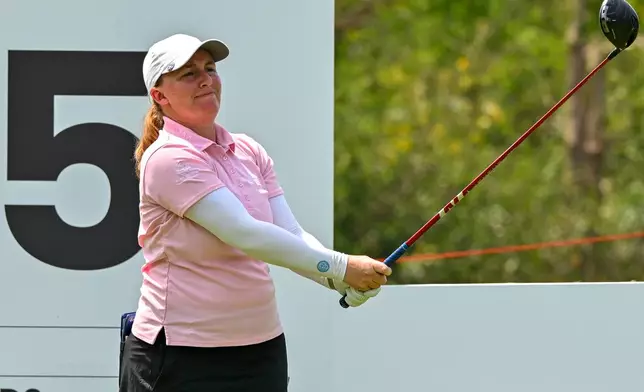 Gemma Dryburgh of Scotland, watches her tee shot on the 5th green during the first round of the LPGA Honda Thailand golf tournament in Pattaya, Thailand, Thursday, Feb. 19, 2026. (AP Photo/Kittinun Rodsupan)