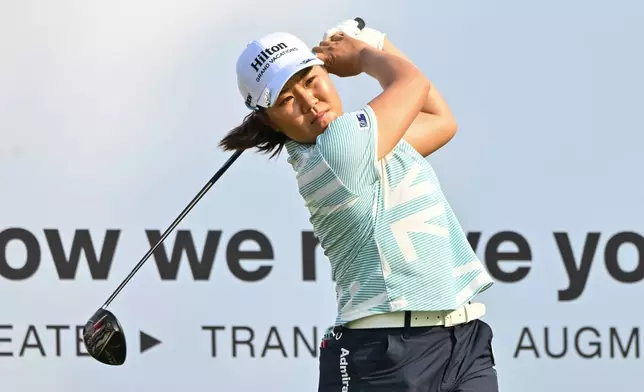Nasa Hataoka, of Japan watches her tee shot on the 1st green during the first round of the LPGA Honda Thailand golf tournament in Pattaya, Thailand, Thursday, Feb. 19, 2026. (AP Photo/Kittinun Rodsupan)