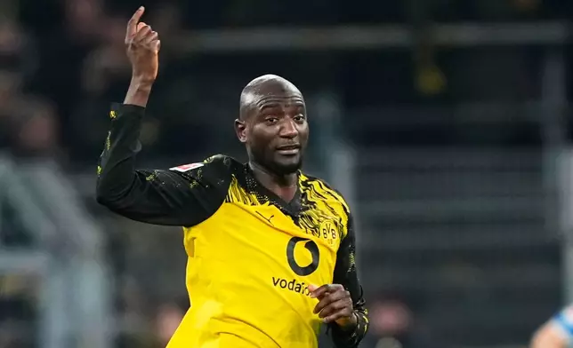 Dortmund's Serhou Guirassy celebrates after scoring during the German Bundesliga soccer match between Borussia Dortmund and FC Heidenheim in Dortmund, Germany, Sunday, Feb. 1, 2026. (AP Photo/Martin Meissner)