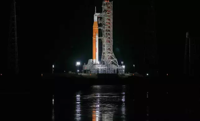 The NASA Artemis II SLS (Space Launch System) rocket with the Orion spacecraft is seen at Launch Complex 39B at the Kennedy Space Center, Sunday, Feb. 1, 2026, in Cape Canaveral, Fla. (AP Photo/John Raoux)