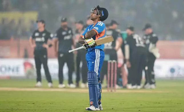 India's captain Suryakumar Yadav waits for third umpire's decision for his wicket during the fourth T20 cricket match between India and New Zealand in Visakhapatnam, India, Wednesday, Jan. 28, 2026. (AP Photo/Aijaz Rahi)