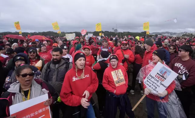 Teachers, students and supporters rally in support of the ongoing teacher's strike at the San Francisco Unified School District at Ocean Beach, in San Francisco, Wednesday, Feb. 11, 2026. (AP Photo/Jeff Chiu)