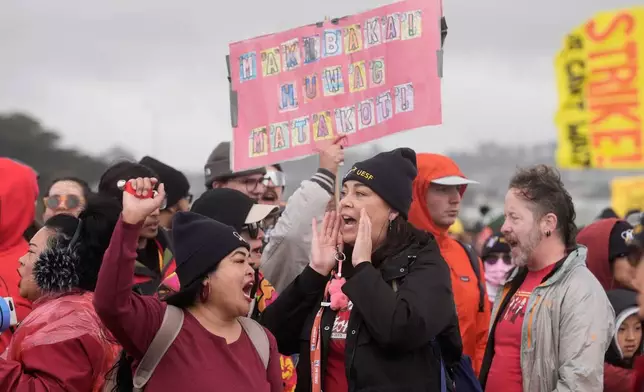 Teachers, students and supporters rally in support of the ongoing teachers strike at the San Francisco Unified School District at Ocean Beach in San Francisco, Wednesday, Feb. 11, 2026. (AP Photo/Jeff Chiu)