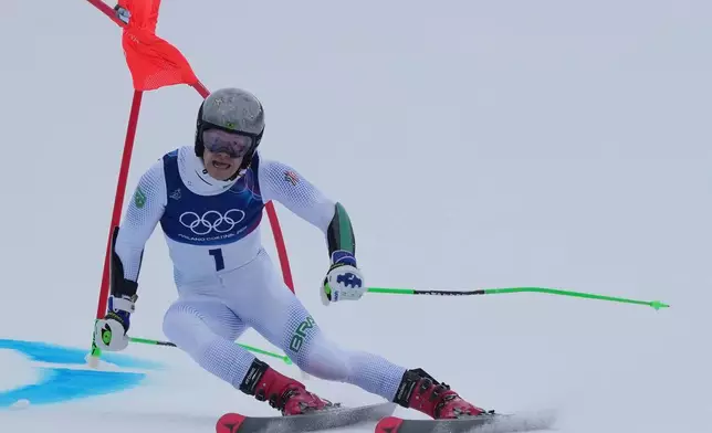 Brazil's Lucas Pinheiro Braathen competes during an alpine ski, men's giant slalom race, at the 2026 Winter Olympics, in Bormio, Italy, Saturday, Feb. 14, 2026. (AP Photo/Julia Demaree Nikhinson)