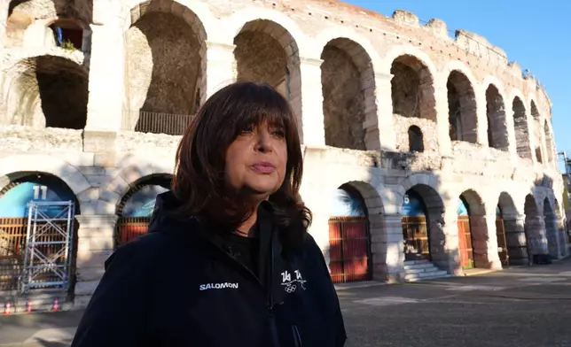 Director of ceremonies Maria Laura Iascone speaks, during an interview with The Associated Press, outside the Arena ahead of the closing ceremony at the 2026 Winter Olympics, in Verona, Italy, Tuesday, Feb. 17, 2026. (AP Photo/Antonio Calanni)