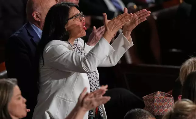 Rep. Rashida Tlaib, D-Mich., gestures as President Donald Trump delivers the State of the Union address to a joint session of Congress in the House chamber at the U.S. Capitol in Washington, Tuesday, Feb. 24, 2026. (AP Photo/Matt Rourke)