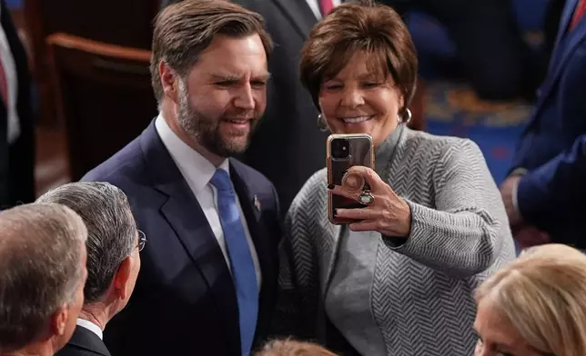 Vice President JD Vance poses for a photo before President Donald Trump delivers the State of the Union address to a joint session of Congress in the House chamber at the U.S. Capitol in Washington, Tuesday, Feb. 24, 2026. (AP Photo/Matt Rourke)