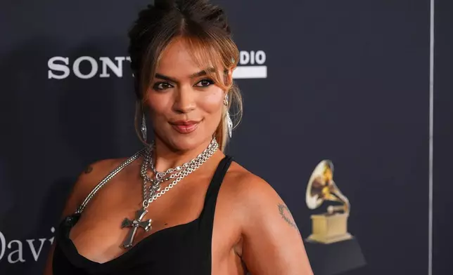 Karol G arrives at the Pre-Grammy Gala on Saturday, Jan. 31, 2026, at the Beverly Hilton Hotel in Beverly Hills, Calif. (AP Photo/Chris Pizzello)