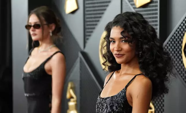 Olivia Dean arrives at the 68th annual Grammy Awards on Sunday, Feb. 1, 2026, in Los Angeles. (Photo by Jordan Strauss/Invision/AP)