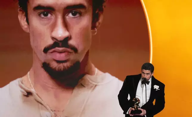 Bad Bunny accepts the award for best música urbana album for "Debí Tirar Más Fotos" during the 68th annual Grammy Awards on Sunday, Feb. 1, 2026, in Los Angeles. (AP Photo/Chris Pizzello)