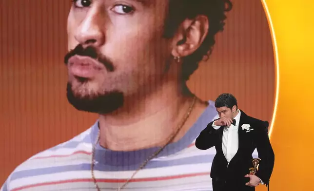 Bad Bunny accepts the award for album of the year for "Debí Tirar Más Fotos" during the 68th annual Grammy Awards on Sunday, Feb. 1, 2026, in Los Angeles. (AP Photo/Chris Pizzello)