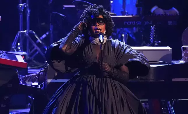 Lauryn Hill performs an in memoriam tribute during the 68th annual Grammy Awards on Sunday, Feb. 1, 2026, in Los Angeles. (AP Photo/Chris Pizzello)