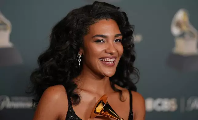 Olivia Dean poses in the press room with the award for best new artist during the 68th annual Grammy Awards on Sunday, Feb. 1, 2026, in Los Angeles. (Photo by Richard Shotwell/Invision/AP)