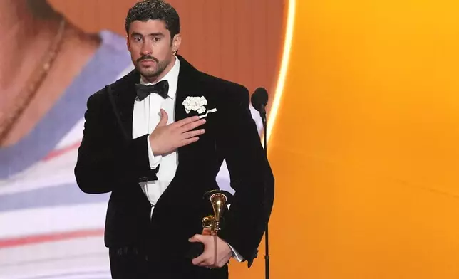 Bad Bunny accepts the award for album of the year for "Debí Tirar Más Fotos" during the 68th annual Grammy Awards on Sunday, Feb. 1, 2026, in Los Angeles. (AP Photo/Chris Pizzello)