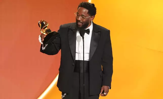 Kendrick Lamar accepts the award for best rap album for "GNX" during the 68th annual Grammy Awards on Sunday, Feb. 1, 2026, in Los Angeles. (AP Photo/Chris Pizzello)
