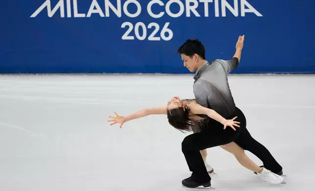 Riku Miura and Ryuichi Kihara of Japan compete during the pairs figure skating long program at the 2026 Winter Olympics, in Milan, Italy, Monday, Feb. 16, 2026. (AP Photo/Natacha Pisarenko)