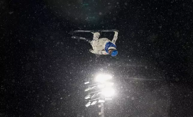 China's Eileen Gu competes during the women's freestyle skiing big air finals at the 2026 Winter Olympics, in Livigno, Italy, Monday, Feb. 16, 2026. (AP Photo/Abbie Parr)