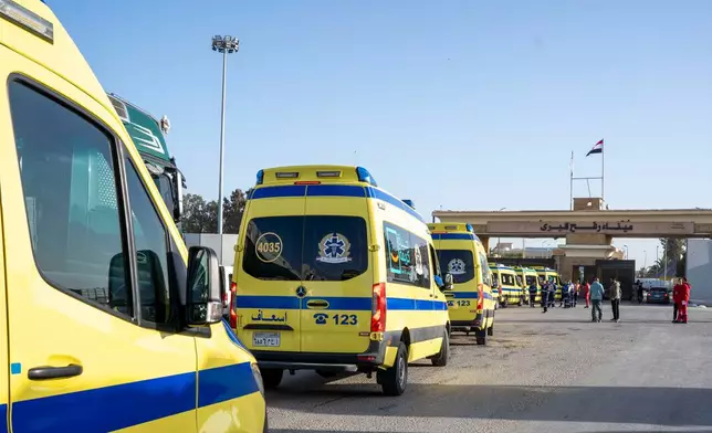 Ambulances line up to enter the Egyptian gate of the Rafah crossing on the way to the Gaza Strip, in Rafah, Egypt, Sunday, Feb. 1, 2026. (AP Photo/Mohamed Arafat)