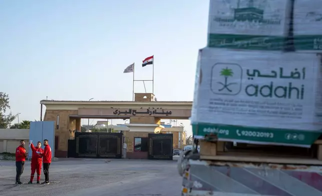 A truck carrying humanitarian aids enters the Egyptian gate of the Rafah crossing, heading for inspection by Israeli authorities before entering the Gaza Strip, in Rafah, Egypt, Sunday, Feb. 1, 2026. (AP Photo/Mohamed Arafat)
