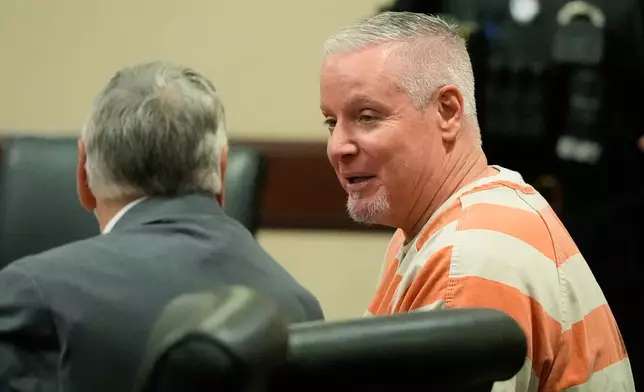 FILE - Colin Gray, the father of Apalachee High School shooting suspect Colt Gray, sits in the courtroom at the Barrow County courthouse, on Thursday, Dec. 18, 2025, in Winder,Ga. (AP Photo/Brynn Anderson, File)