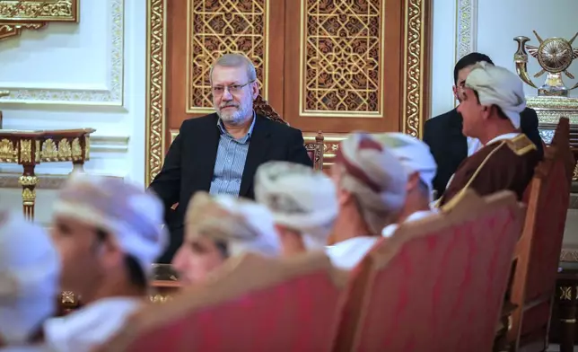 In this photo released by Iran's Supreme National Security Council office, Secretary of the Supreme National Security Council Ali Larijani attends a meeting in Muscat, Oman, Tuesday, Feb. 10, 2026. (Erfan Kouchari/Iran's Supreme National Security Council Office via AP)