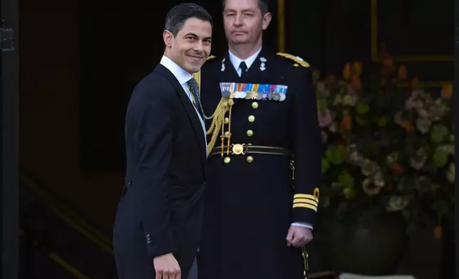 Rob Jetten,leader of the Democrats 66, D66, arrives to be sworn in as prime minister by King Willem-Alexander at Royal Palace Huis ten Bosch in The Hague, Netherlands, Monday, Feb. 23, 2026. (AP Photo/Peter Dejong)