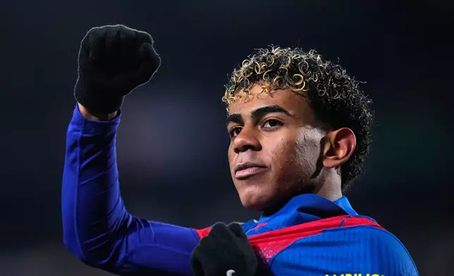 Barcelona's Lamine Yamal celebrates the opening goal during a Copa del Rey quarterfinal soccer match between Albacete and Barcelona, in Albacete, Spain, Tuesday, Feb. 3, 2026. (AP Photo/Manu Fernandez)